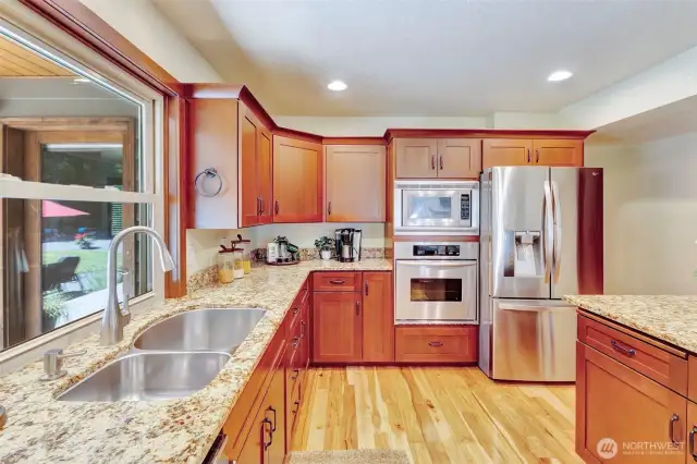 Love this XL, deep sink & view to the backyard.