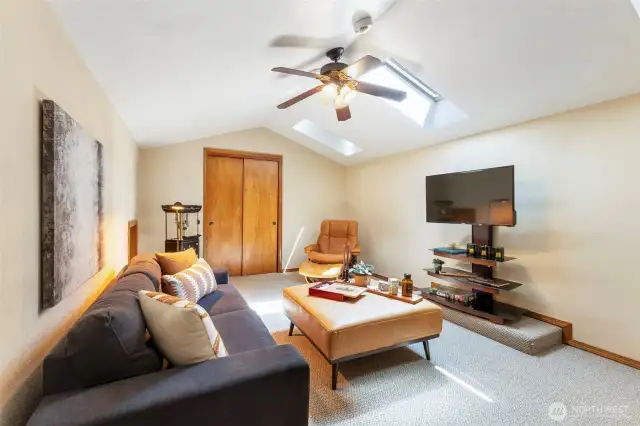 Bonus Room above the garage, off the laundry room stairs.