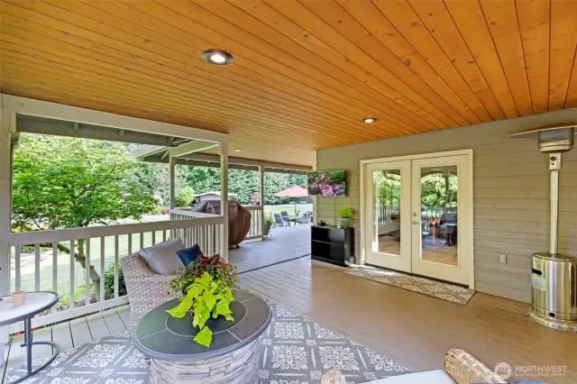 Wraparound porch, great for parties, grilling, relaxing & staying dry all seasons.