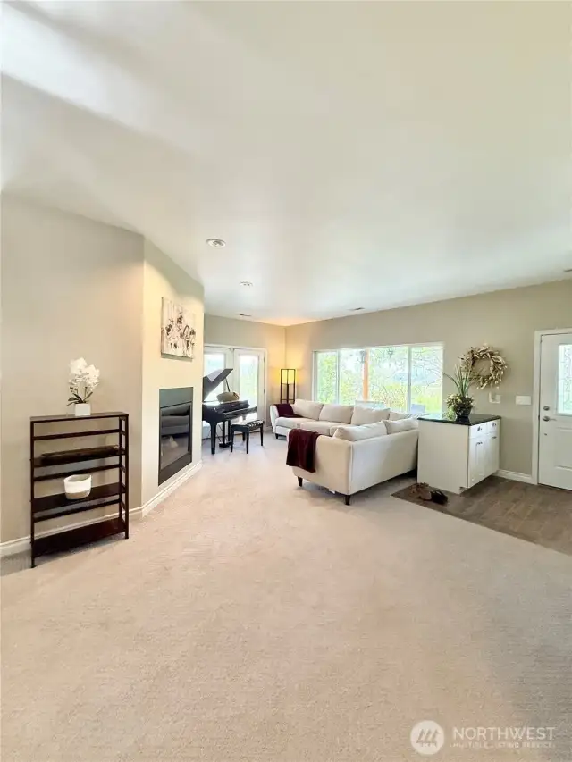 Living Room - by front door w/propane fireplace