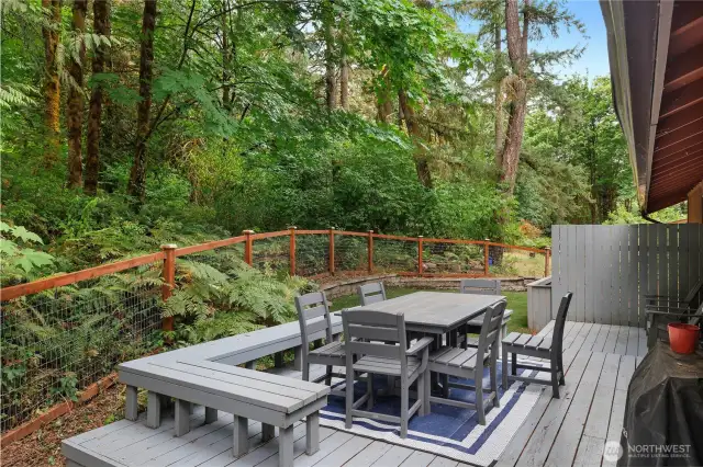 And just off the DR is a nice private deck and backyard with new sod, fencing and hardscape!