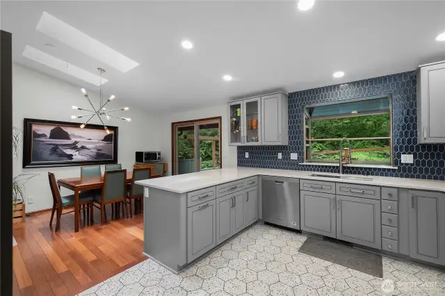 Cool tile flooring and a delightful tile backsplash!
