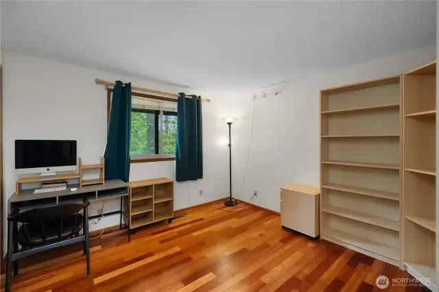 The 3rd main floor BR with nice wood floors, also...