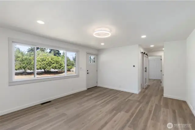 Wonderful privacy with a mature hedge of trees! Fruit and rhodies.