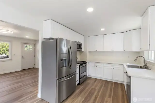 Brand new from floor to ceiling. All new cabinets, granite countertops and stainless steel appliances.