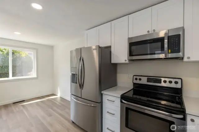 An actual eat in kitchen with an area for a nice table set.