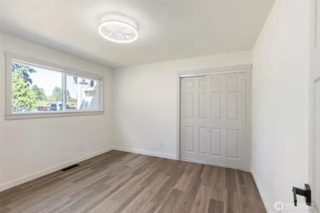 2nd bedroom located at the front of the home across from the hallway bathroom.
