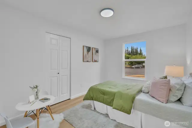 The second bedroom offers a generous closet and bright window, making it perfect for anyone.
