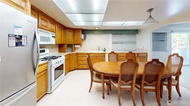 Open floor plan with large kitchen with dining space, lots of cabinet and counter space, all appliances included and more!