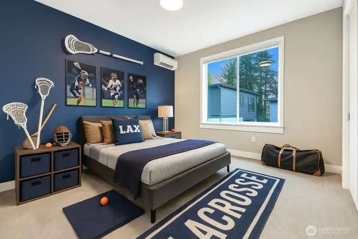 Virtually staged as a lacrosse-themed bedroom to illustrate how this spacious secondary room can inspire any young athlete. Easily accommodates a queen bed, two nightstands, plus wall space for a dresser or desk.