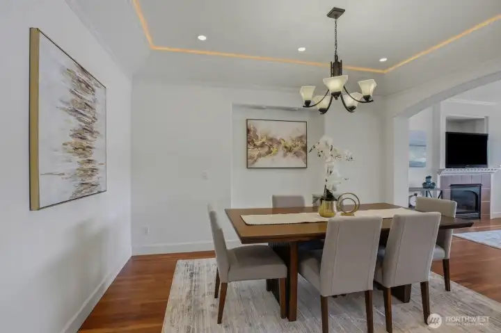 Formal dining room which opens to the family room.