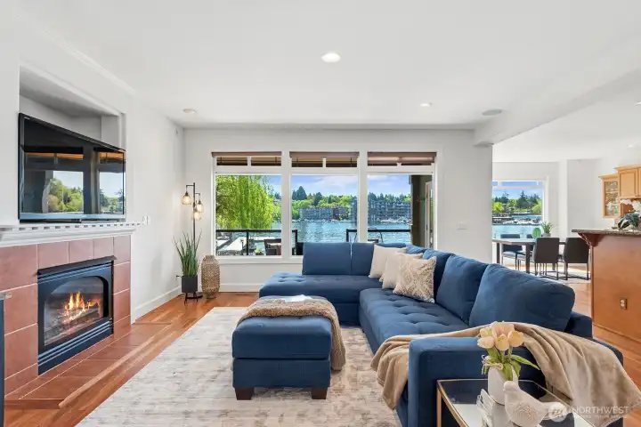 Beautiful light filled family room with fireplace and easy access to outdoor living.