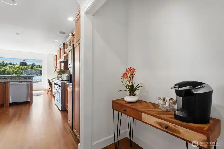 Terrific space to create a coffee bar, prep area or to use however you choose. Located between the kitchen and office. A walk-in pantry is on the opposite wall.