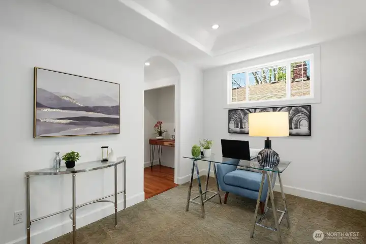 The thoughtfully designed floor plan also includes a convenient home office.