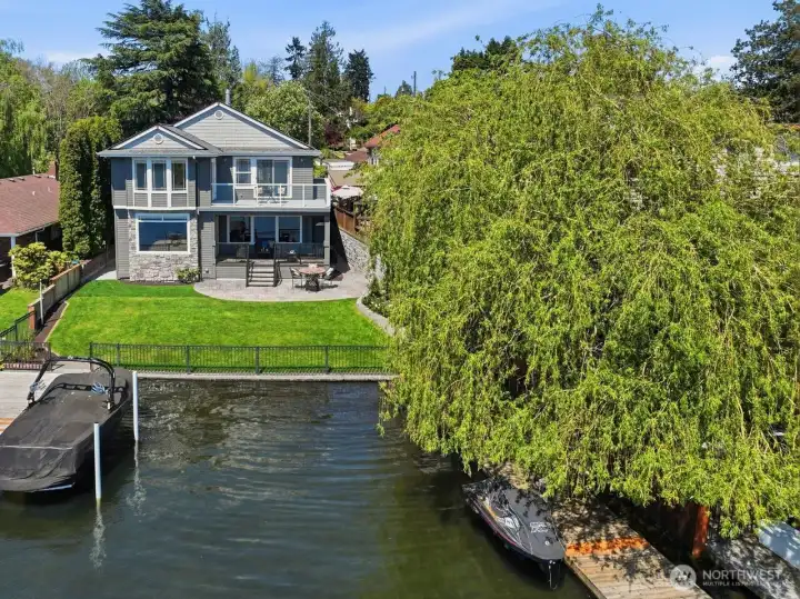 Two expansive docks includes a boat lift, jet ski lift and 50-amp shore power on the dock.