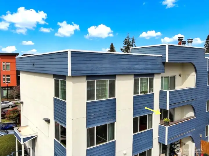The unit's covered deck can be seen in this photo.