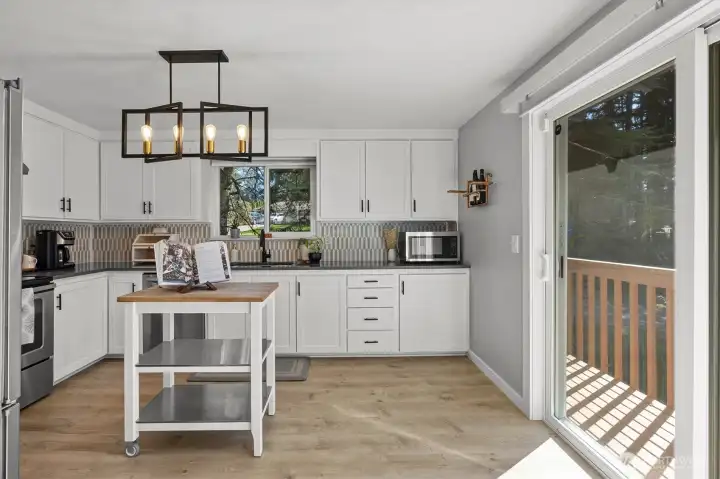 Kitchen, w/ access to deck