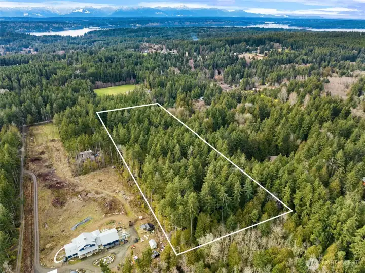 9.91 Acres of nicely level land gently soping to the west with no critical areas showing on City map. Divide into 4 parcels or keep as an island sanctuary.