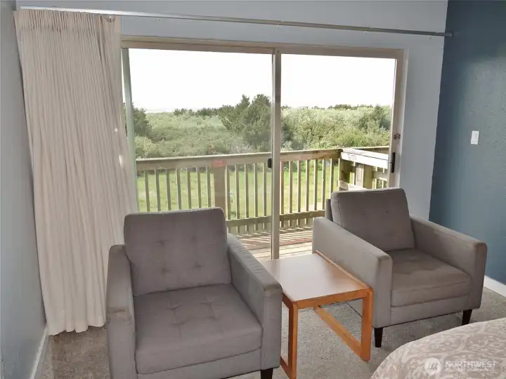 Sitting Area w/a huge slider glass door.