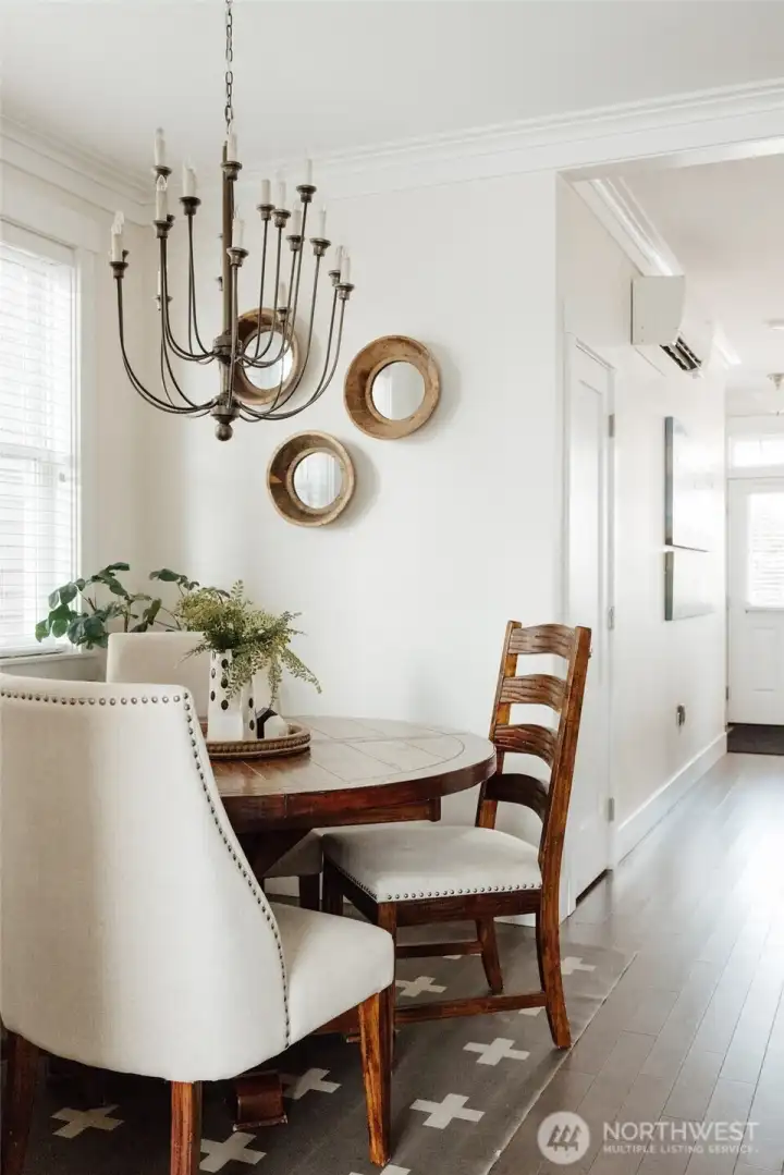 Off the kitchen is a dining nook and off the backdoor is a mudroom and powder bath.