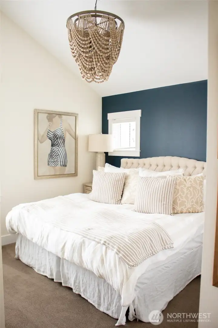 Upstairs are three beautiful bedrooms and two full baths.