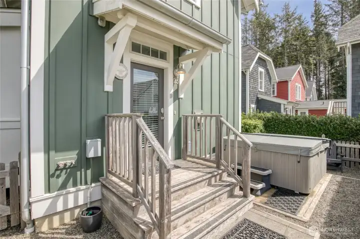 Off the back entry door is a hot tub and fenced back yard with a hot/cold shower to rinse off the kids and pups.