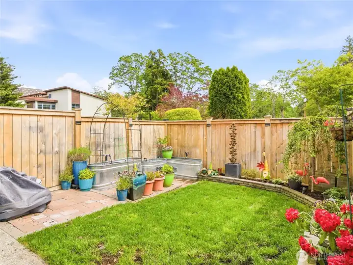 The backyard offers just the right amount of space to garden, entertain, or unwind without spending every weekend on yard work. The backyard offers just the right amount of space to garden, entertain, or unwind without spending every weekend on yard work.