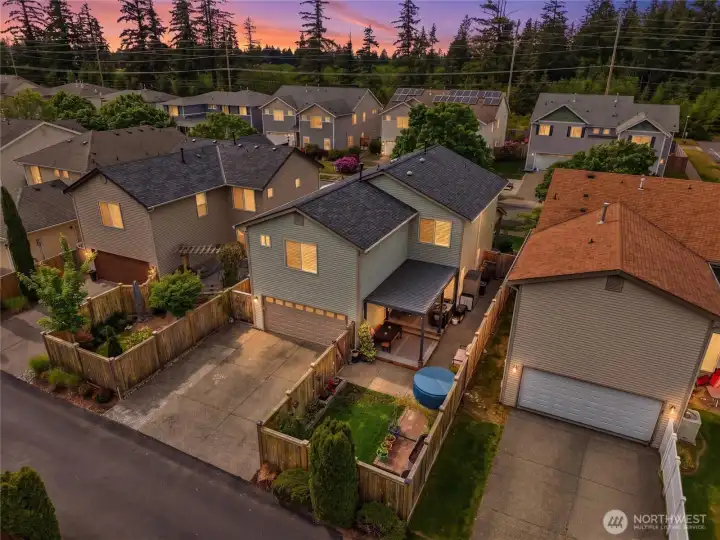 Twilight views really showcase how warm and welcoming this home feels at the end of the day. Home has Trimlights installed! Twilight views really showcase how warm and welcoming this home feels at the end of the day. Home has Trimlights installed!