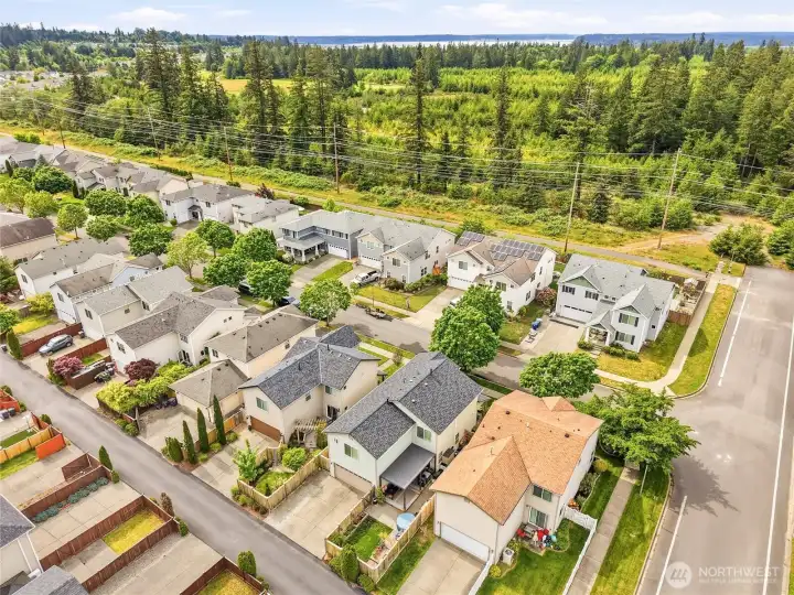 Aerial views highlight the balance of neighborhood convenience and Pacific Northwest greenery surrounding the community. Aerial views highlight the balance of neighborhood convenience and Pacific Northwest greenery surrounding the community.