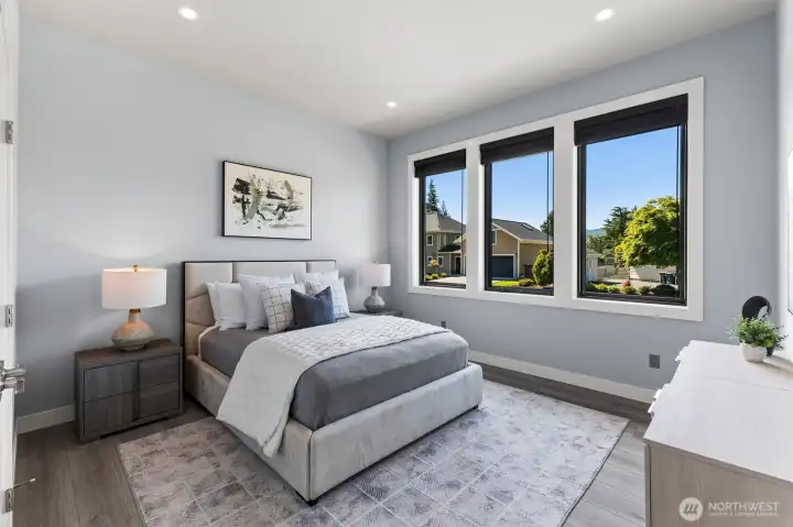 Main level spacious guest suite with abundance of natural lighting.