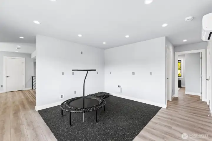 This level could be a complete self-contained suite with A/C Heat Pump, 2 bedrooms, full  bath, laundry, Kitchen & separate exterior entry.