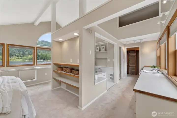 Upper primary suite is open to all of the gorgeous views.