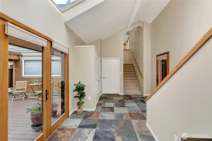 Foyer view looking towards garage door and back wing.