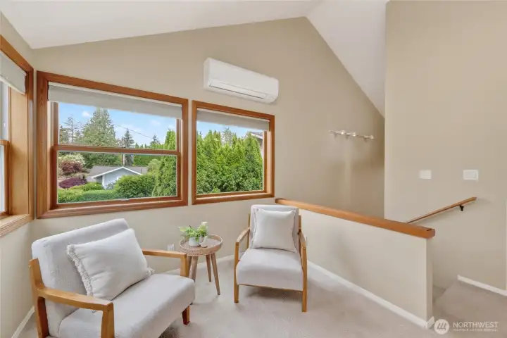 Landing at the top of the stairs is perfect for T.V watching or a den area.