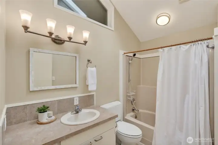 Upstairs bathroom with skylight.