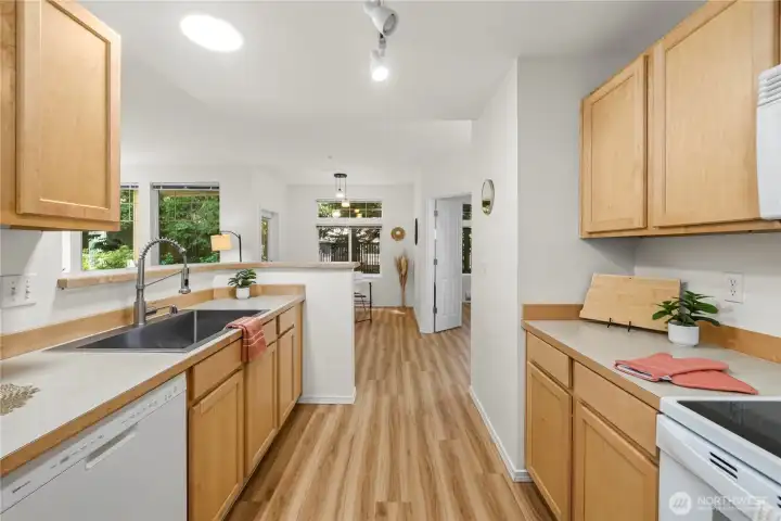 Beautiful galley kitchen with SS Farmhouse sink