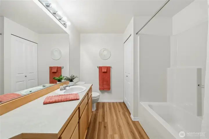 Main Bath with large vanity and tub/shower combo