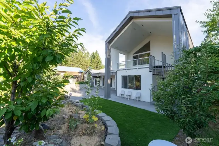 Terraced garden beds with fruit trees and berries Terraced garden beds with fruit trees and berries