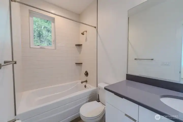Attached bathroom for main floor bedroom #1 Attached bathroom for main floor bedroom #1
