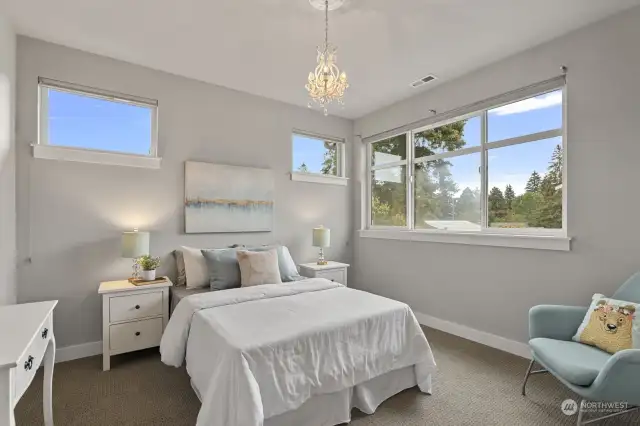 Second upstairs bedroom with wonderful natural light.