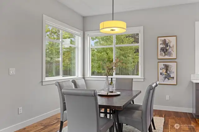 Host the holidays here! There's room for everyone at the table in this dining area.