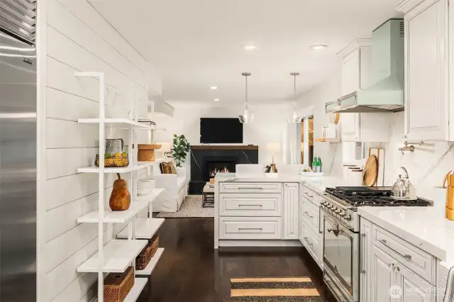 Plentiful storage and counter space adorn this pristine cooking sanctuary.