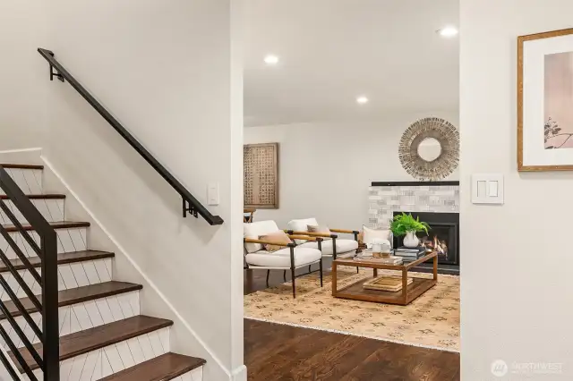 Views from the foyer looking into the living space. The distinctive staircase is also showcased here.