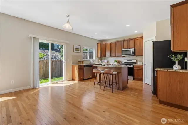 Extend your living space outdoors to the patio and fully-fenced back yard