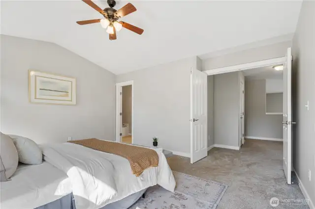 Looking toward the entry and en suite bath. Don't miss the walk-in closet & 5-piece en suite bath!