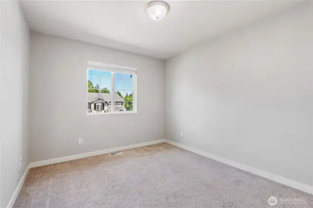 Bedroom #3 features newer carpet & fresh paint!