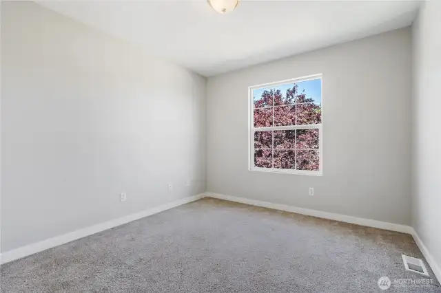Bedroom #4 features newer carpet & fresh paint!
