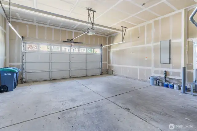 Large sized 2 car garage providing ample storage spaces
