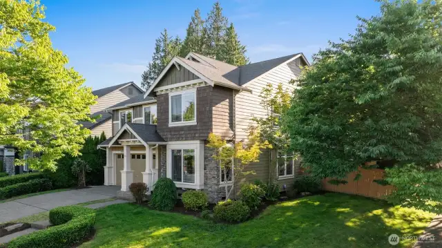 Sunny East-facing corner lot in sought-after Seasons at Mill Creek