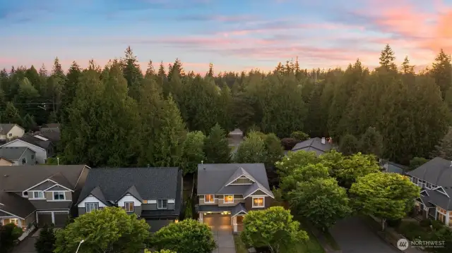 Tree lined corner lot with extra parking on the side